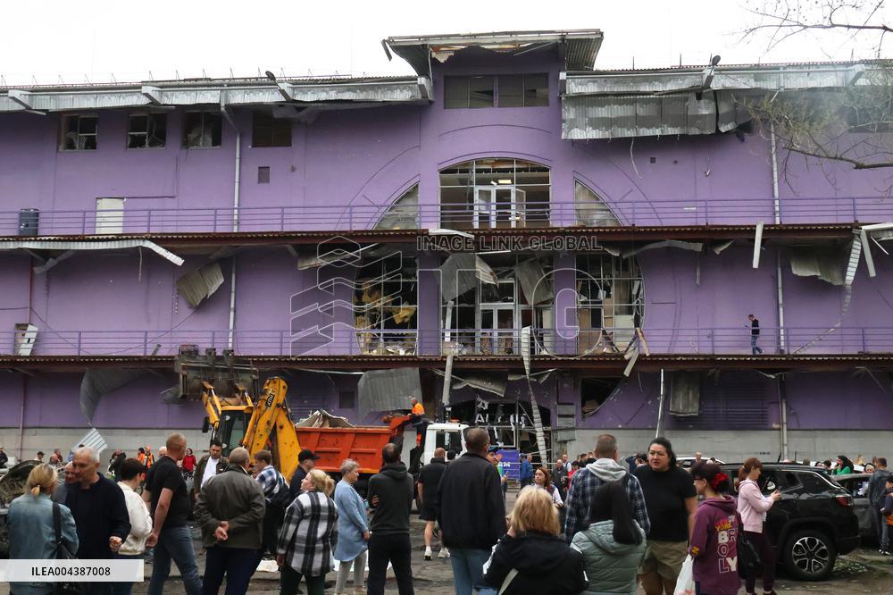 Shopping center, supermarket and residential building damaged by shelling in Kyiv