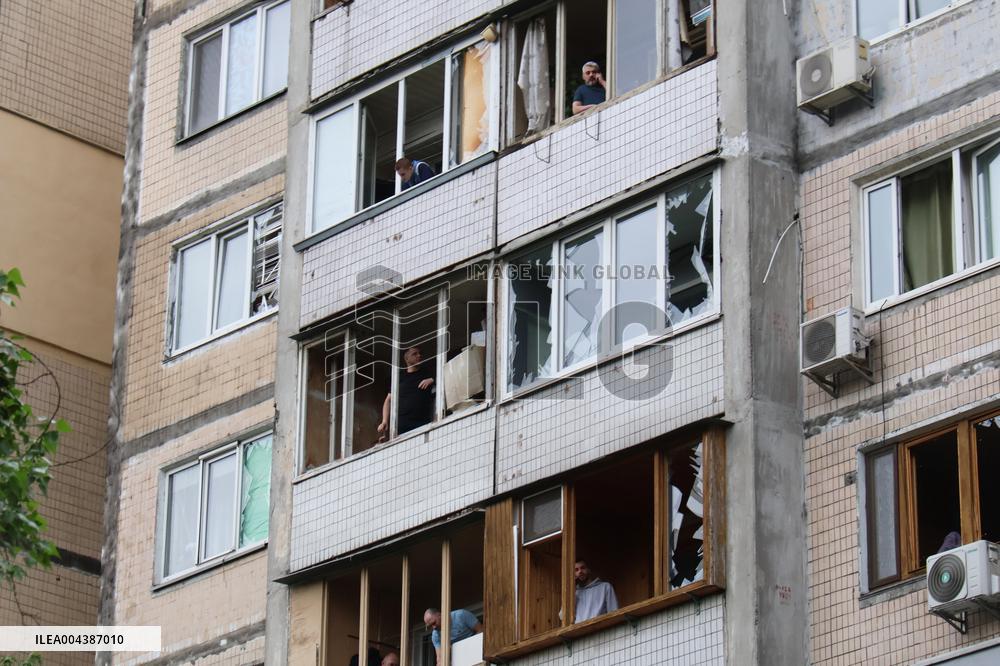 Shopping center, supermarket and residential building damaged by shelling in Kyiv