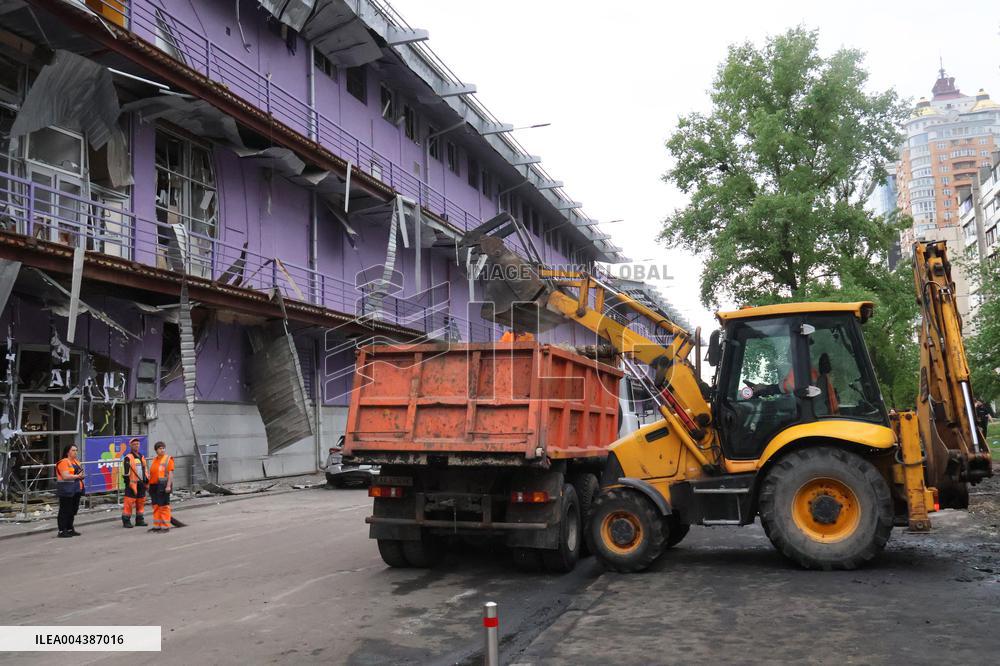 Shopping center, supermarket and residential building damaged by shelling in Kyiv