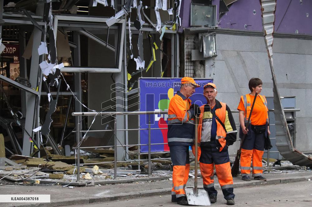 Shopping center, supermarket and residential building damaged by shelling in Kyiv