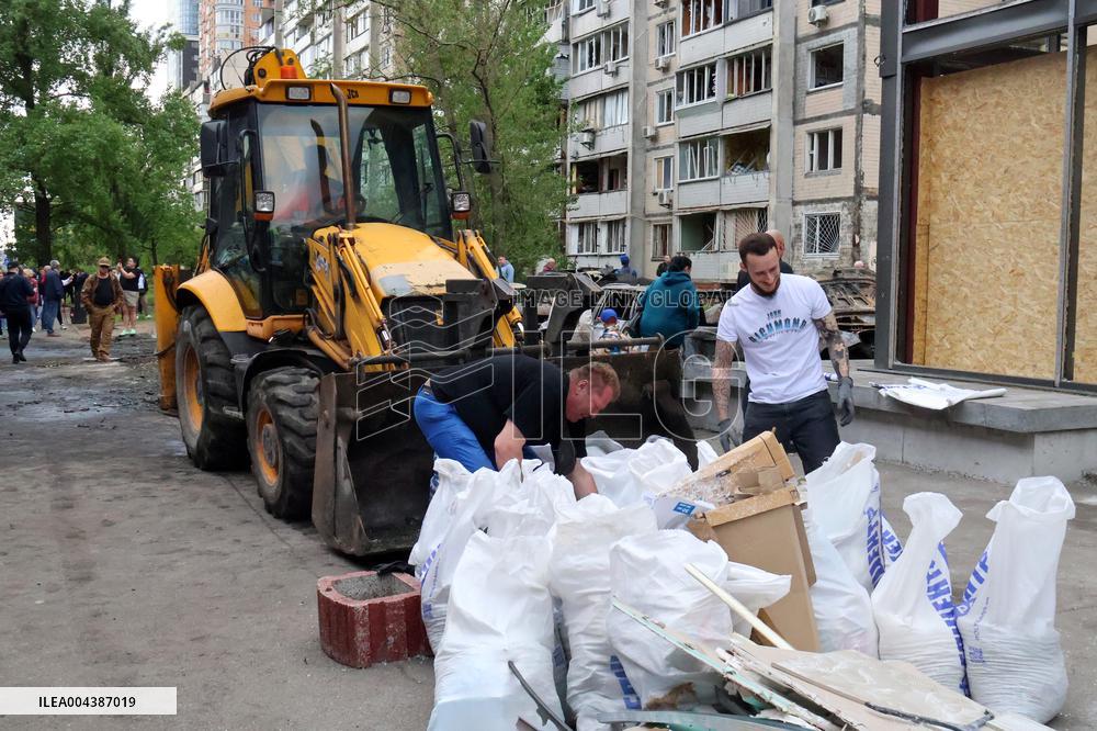 Shopping center, supermarket and residential building damaged by shelling in Kyiv
