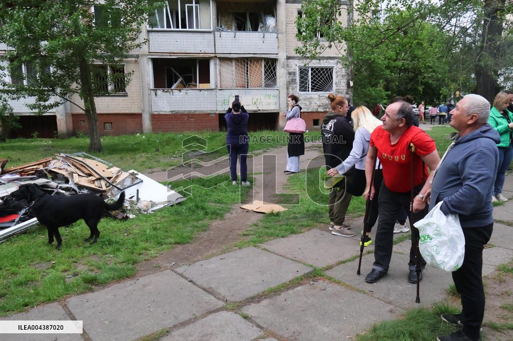 Shopping center, supermarket and residential building damaged by shelling in Kyiv