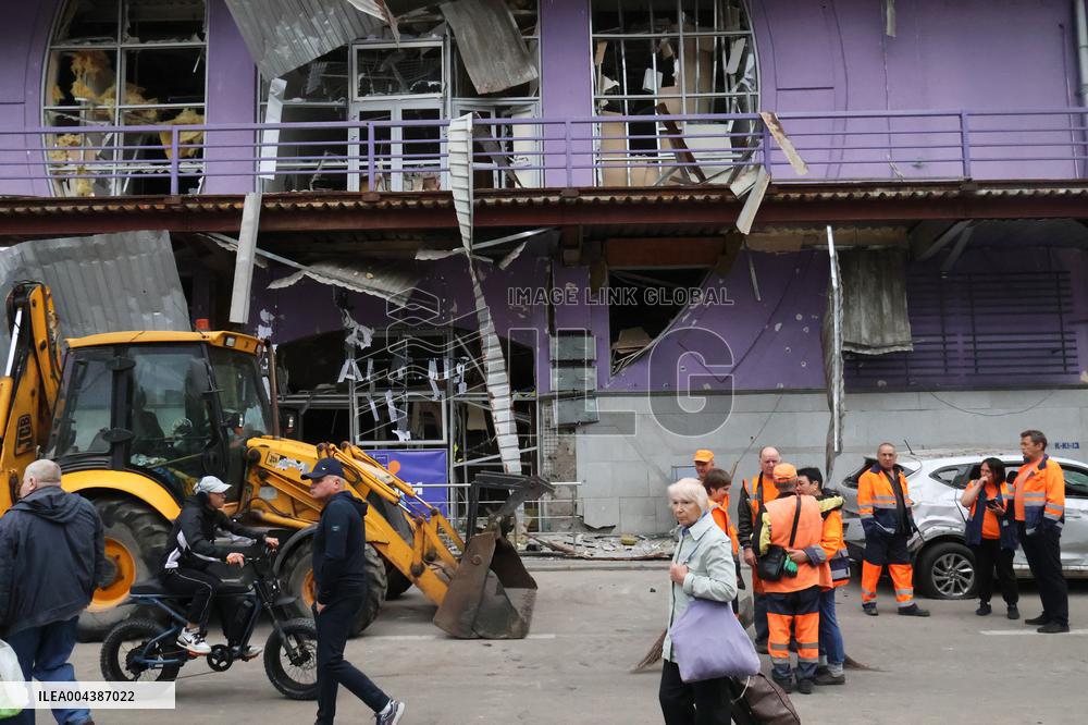 Shopping center, supermarket and residential building damaged by shelling in Kyiv