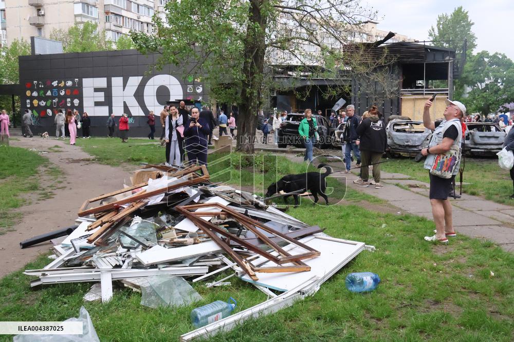 Shopping center, supermarket and residential building damaged by shelling in Kyiv