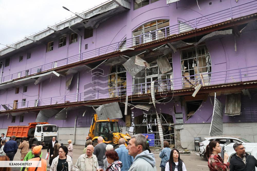 Shopping center, supermarket and residential building damaged by shelling in Kyiv