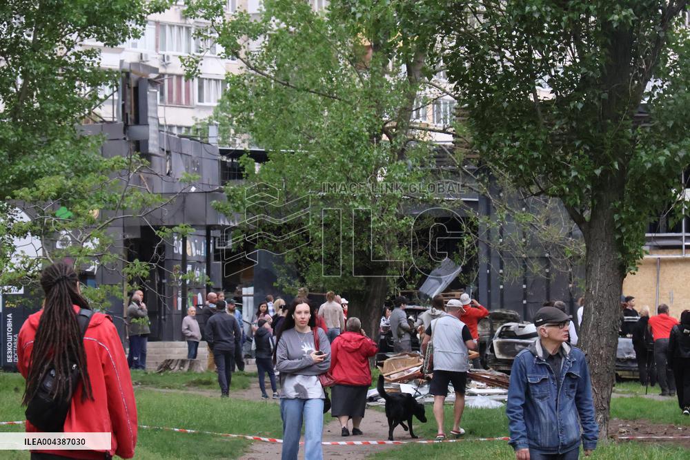 Shopping center, supermarket and residential building damaged by shelling in Kyiv