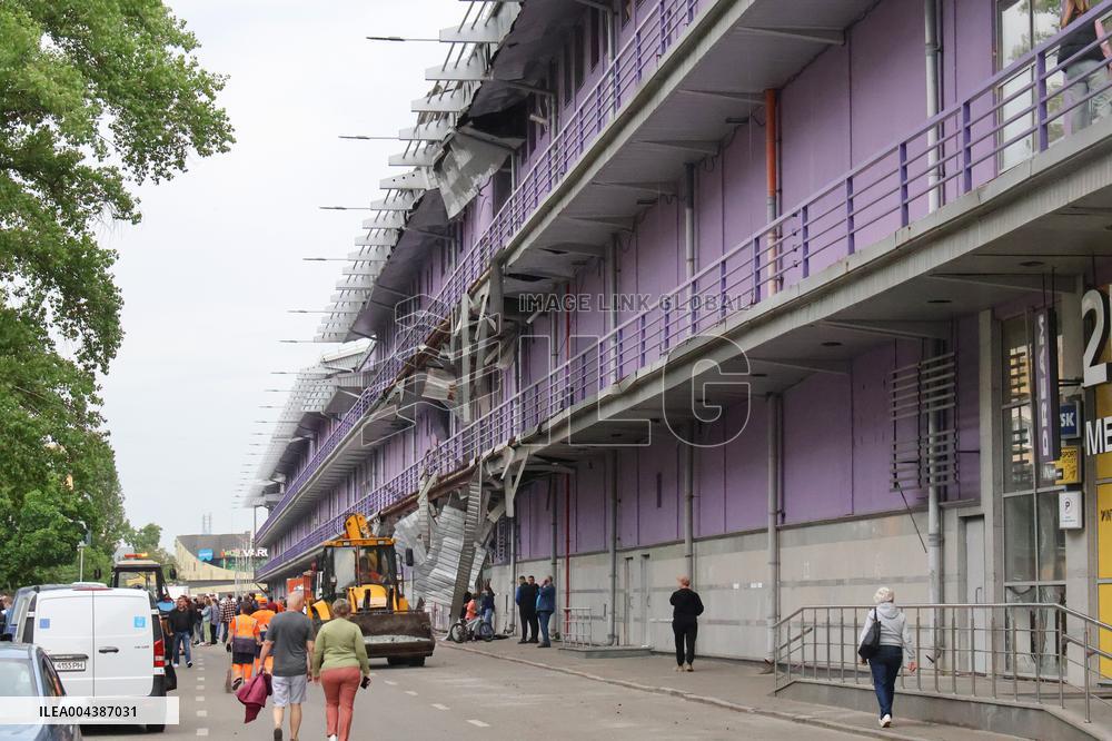 Shopping center, supermarket and residential building damaged by shelling in Kyiv