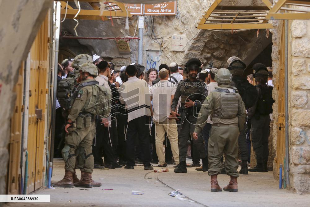 Israeli Forces Escort Settlers - Hebron