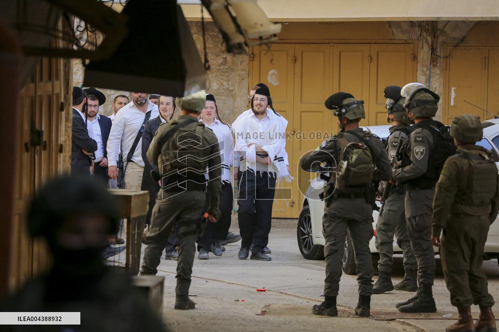 Israeli Forces Escort Settlers - Hebron