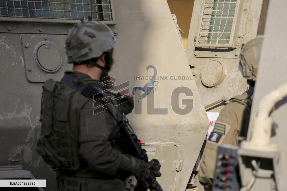 Israeli Forces Escort Settlers - Hebron