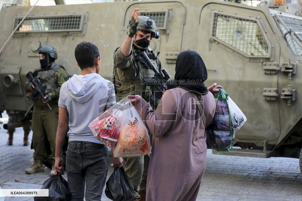 Israeli Forces Escort Settlers - Hebron
