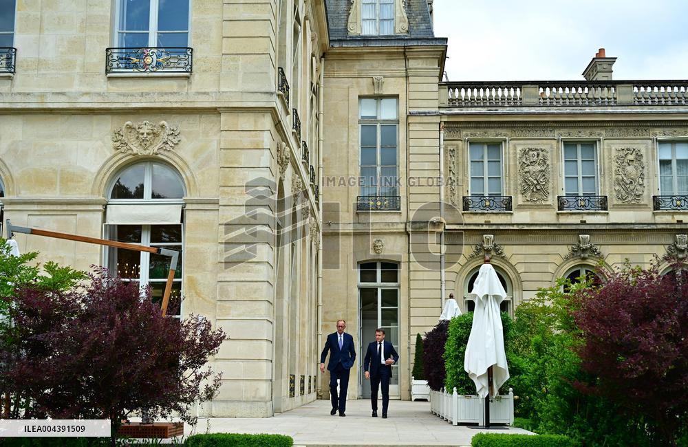 Macron and Merz Discuss in Elysee Garden - Paris