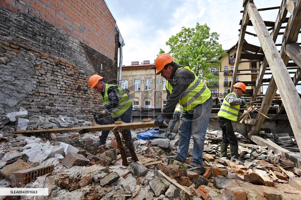 Building damaged by Russian attack gets dismantled in Lviv
