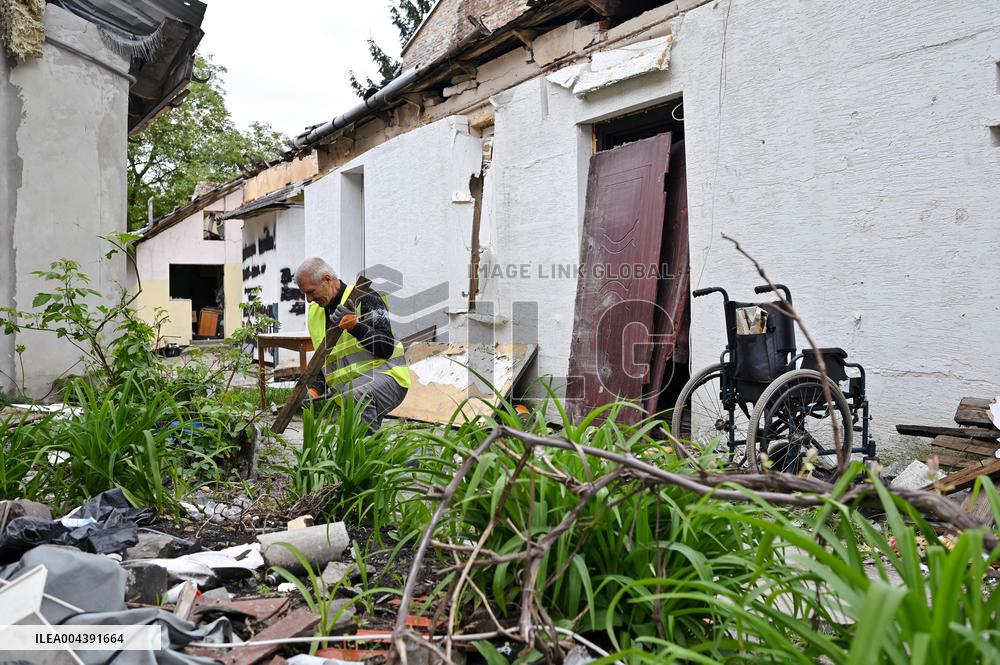Building damaged by Russian attack gets dismantled in Lviv