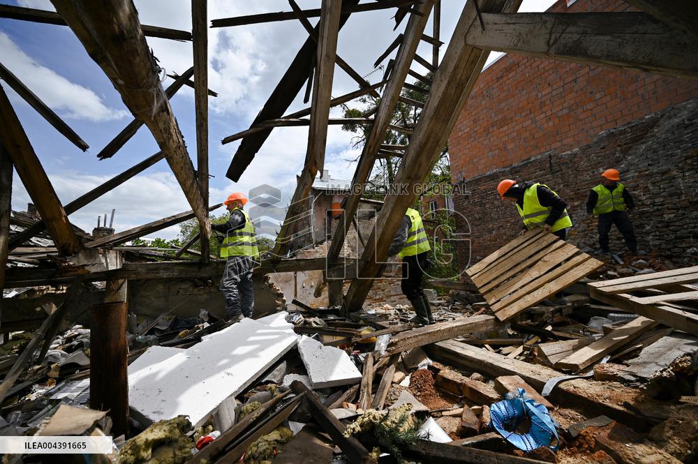 Building damaged by Russian attack gets dismantled in Lviv