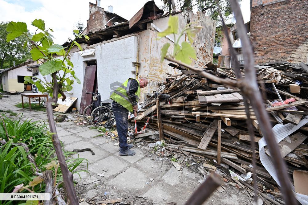 Building damaged by Russian attack gets dismantled in Lviv