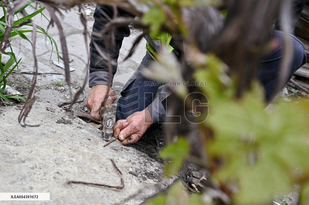 Building damaged by Russian attack gets dismantled in Lviv