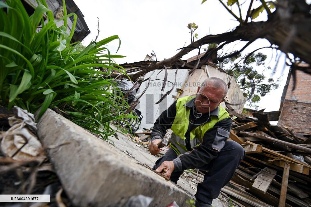Building damaged by Russian attack gets dismantled in Lviv