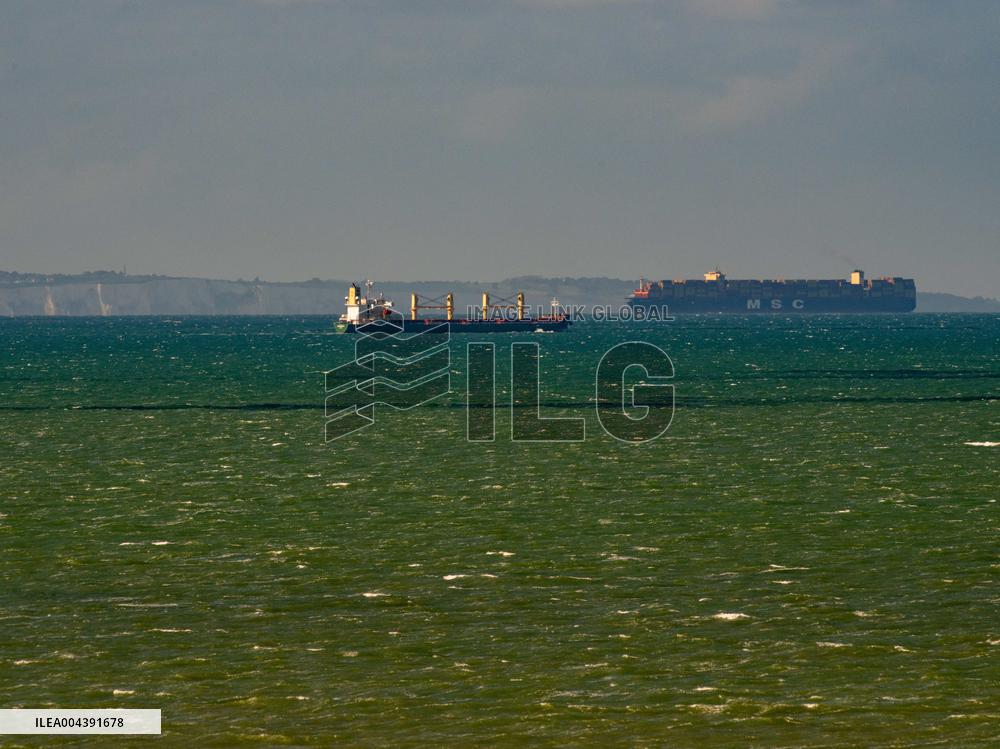 Container Ship Meets Ferry in the English Channel - France