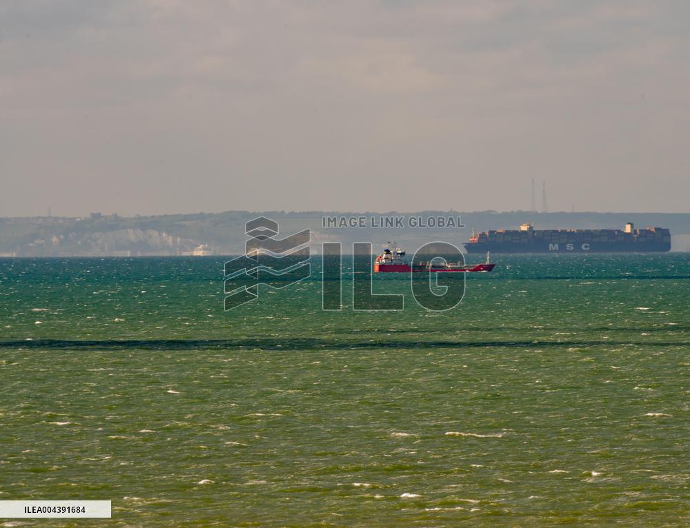 Container Ship Meets Ferry in the English Channel - France