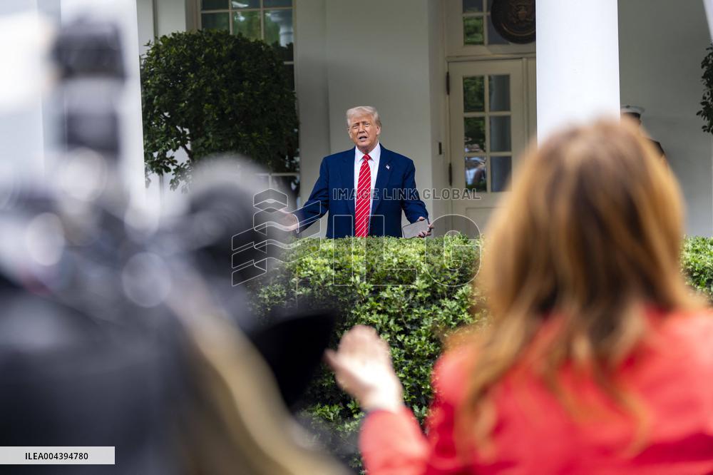 President Donald Trump Speaks with Reporters Outside Oval