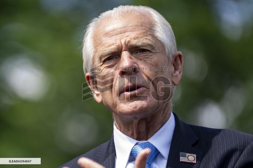Senior Counselor Navarro Speaks with Reporters Outside West Wing