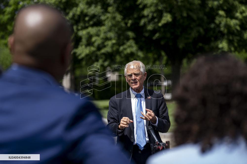 Senior Counselor Navarro Speaks with Reporters Outside West Wing