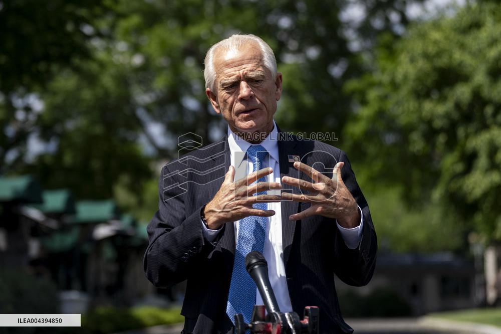 Senior Counselor Navarro Speaks with Reporters Outside West Wing