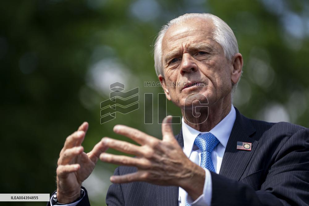 Senior Counselor Navarro Speaks with Reporters Outside West Wing