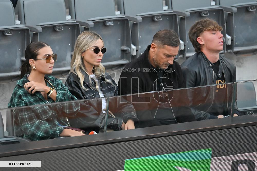 Francesco Totti with his partner Noemi Bocchi and his children Chanel and Cristian