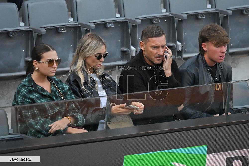 Francesco Totti with his partner Noemi Bocchi and his children Chanel and Cristian