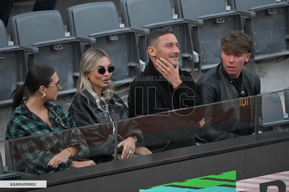 Francesco Totti with his partner Noemi Bocchi and his children Chanel and Cristian