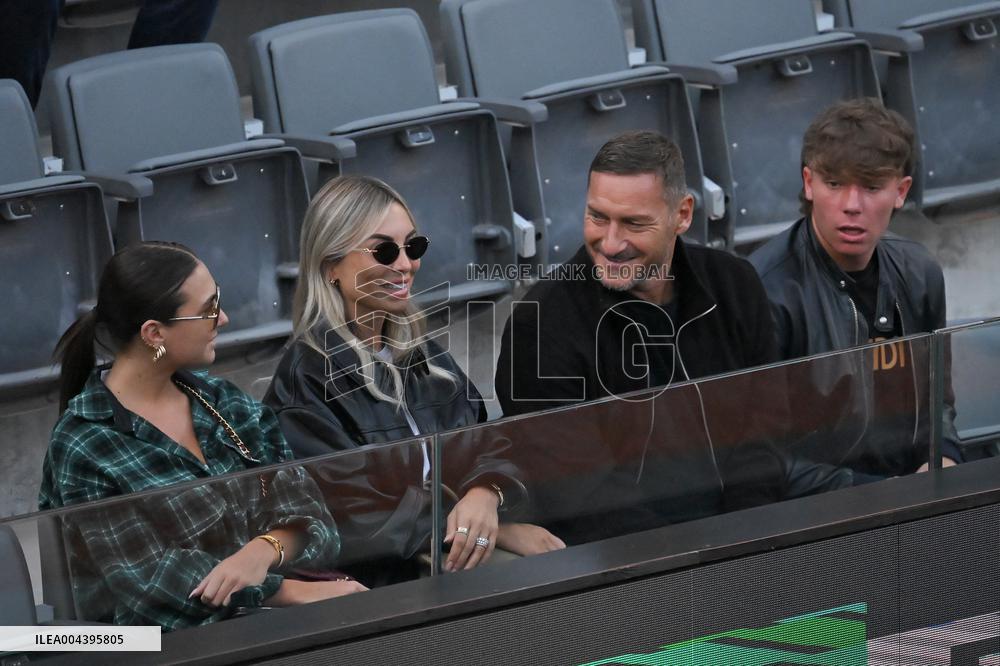 Francesco Totti with his partner Noemi Bocchi and his children Chanel and Cristian