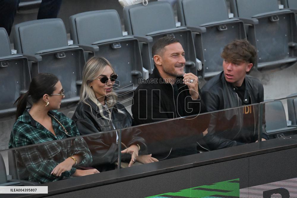 Francesco Totti with his partner Noemi Bocchi and his children Chanel and Cristian