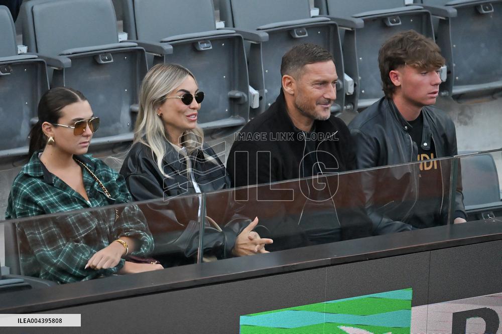 Francesco Totti with his partner Noemi Bocchi and his children Chanel and Cristian