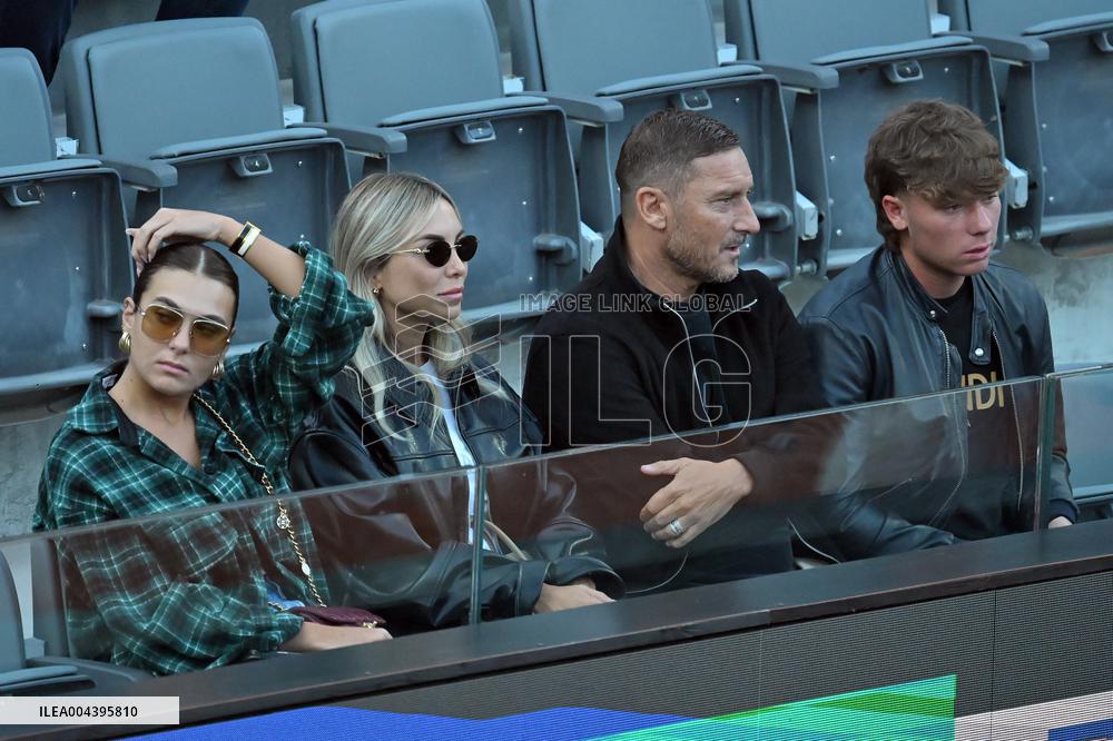 Francesco Totti with his partner Noemi Bocchi and his children Chanel and Cristian