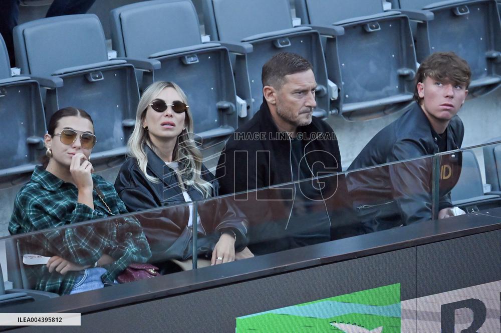 Francesco Totti with his partner Noemi Bocchi and his children Chanel and Cristian