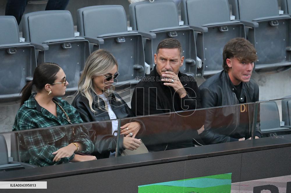 Francesco Totti with his partner Noemi Bocchi and his children Chanel and Cristian