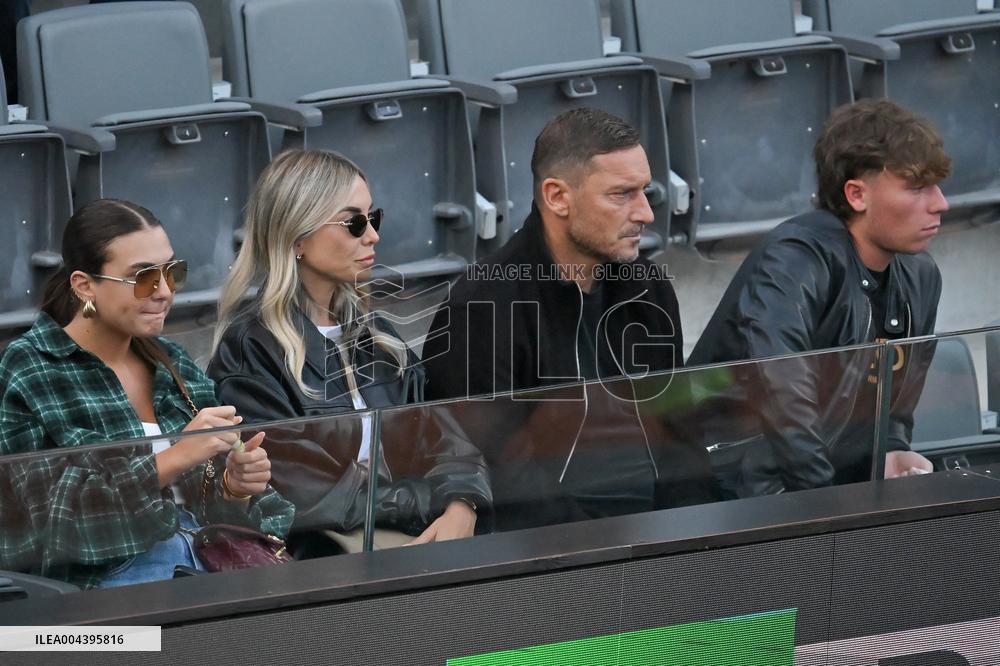 Francesco Totti with his partner Noemi Bocchi and his children Chanel and Cristian
