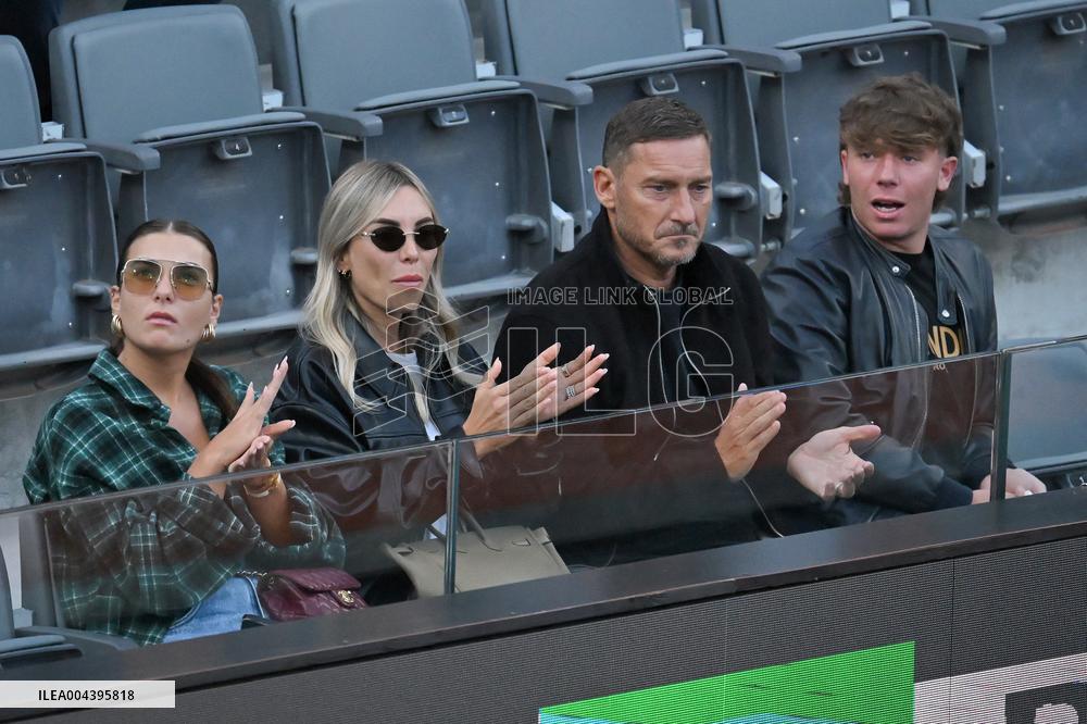 Francesco Totti with his partner Noemi Bocchi and his children Chanel and Cristian