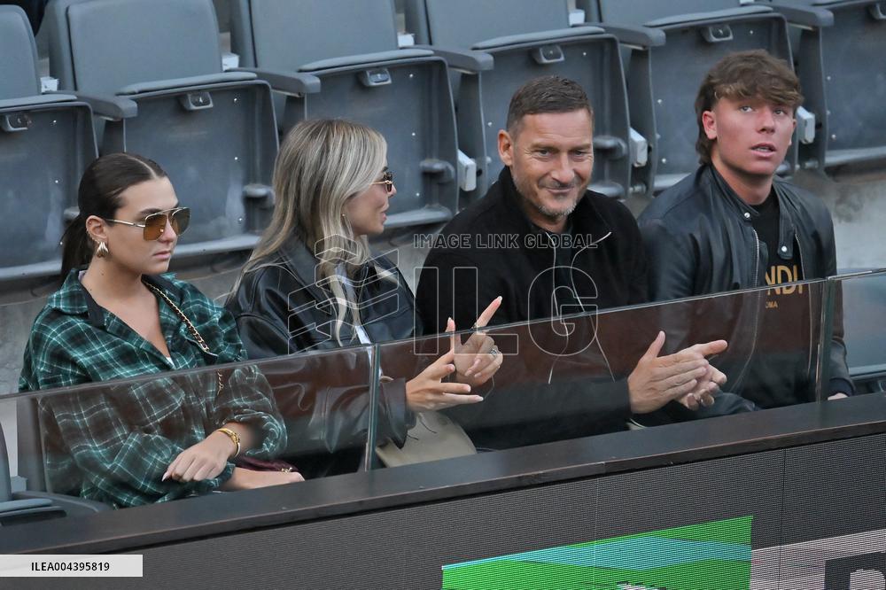 Francesco Totti with his partner Noemi Bocchi and his children Chanel and Cristian