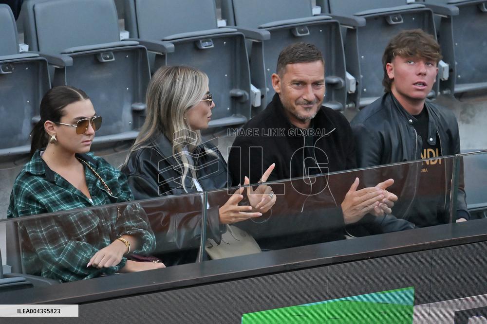 Francesco Totti with his partner Noemi Bocchi and his children Chanel and Cristian