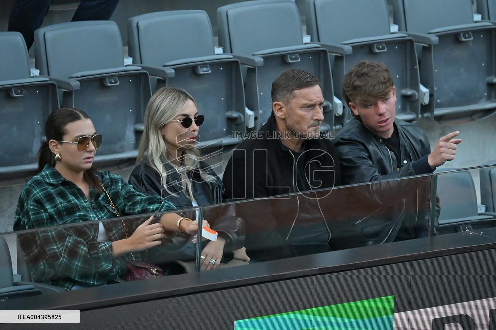 Francesco Totti with his partner Noemi Bocchi and his children Chanel and Cristian