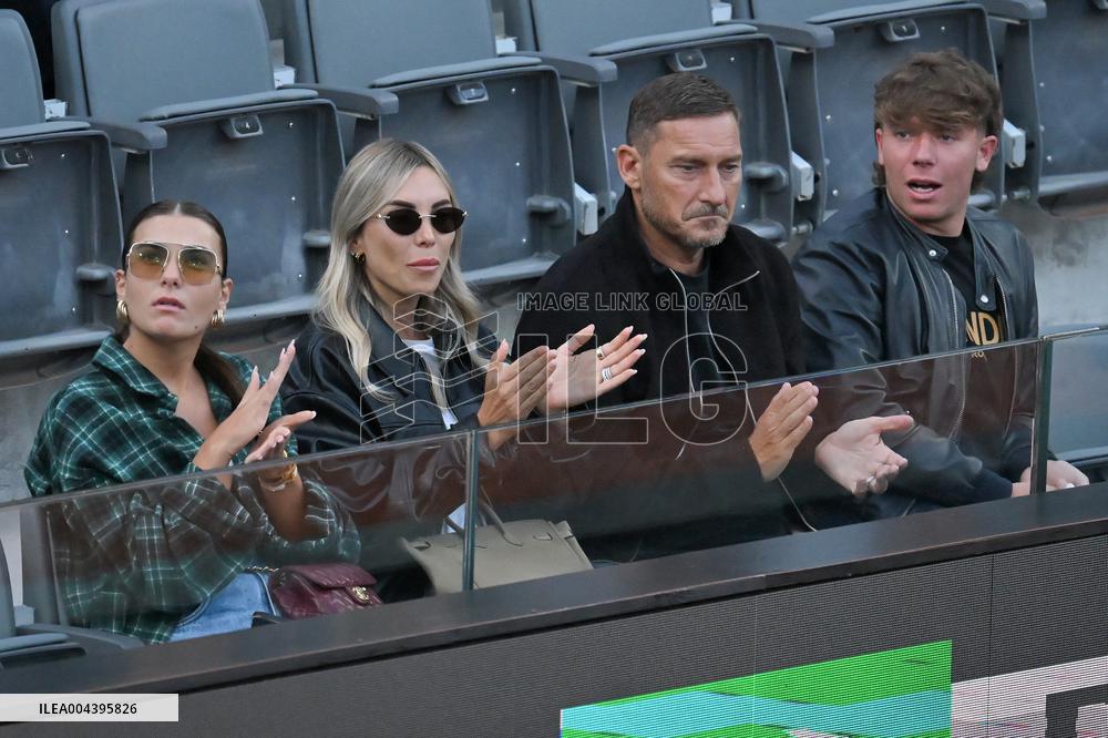 Francesco Totti with his partner Noemi Bocchi and his children Chanel and Cristian