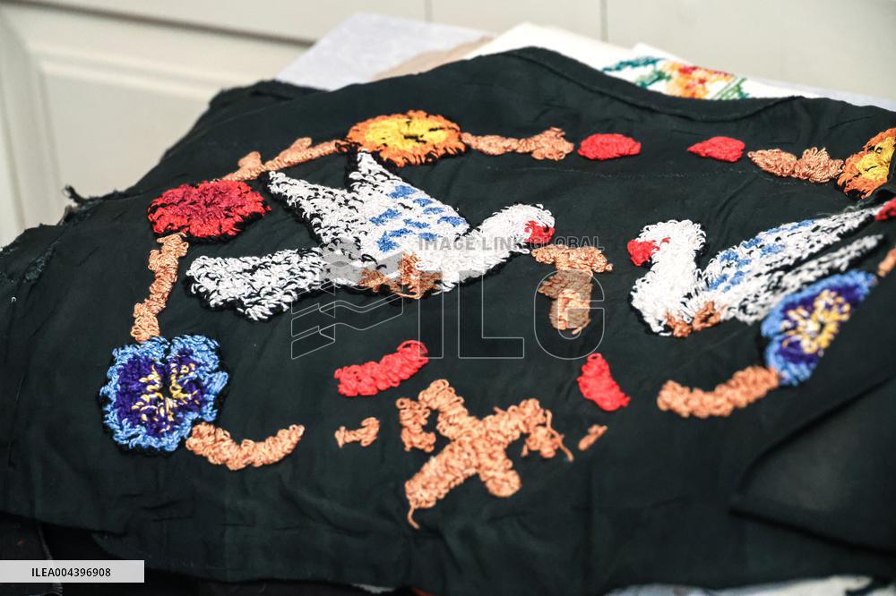 Collection of old Bulgarian towels, clothes and jewelry in Krynychne village