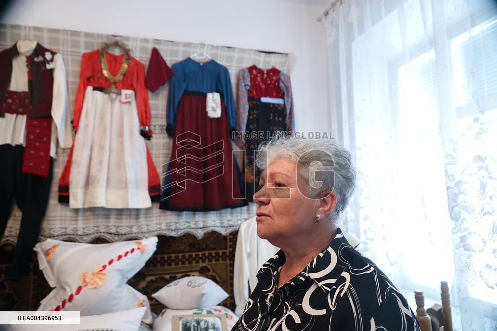 Collection of old Bulgarian towels, clothes and jewelry in Krynychne village