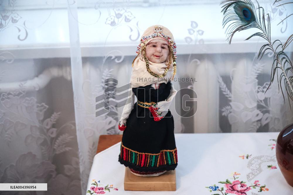 Collection of old Bulgarian towels, clothes and jewelry in Krynychne village