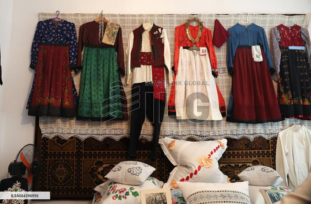 Collection of old Bulgarian towels, clothes and jewelry in Krynychne village
