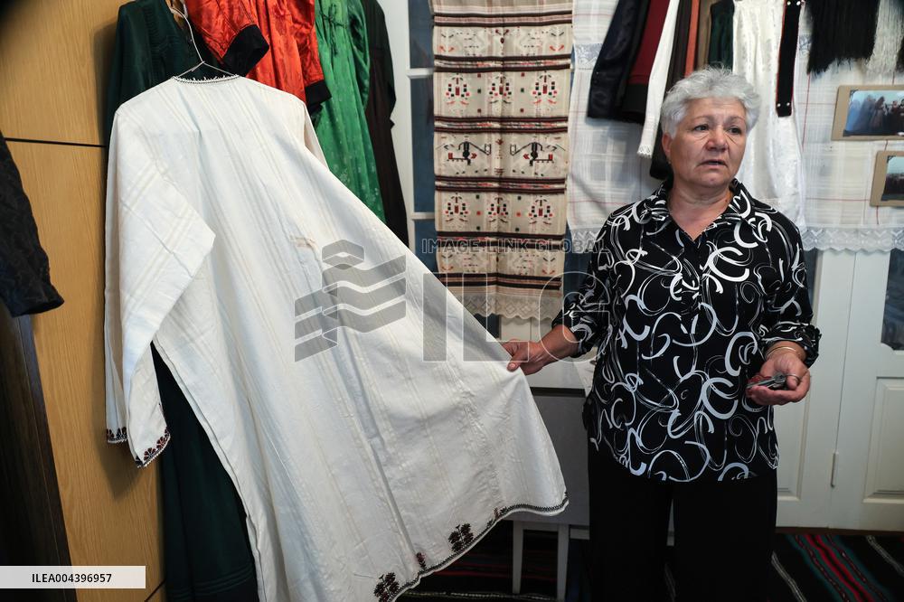 Collection of old Bulgarian towels, clothes and jewelry in Krynychne village