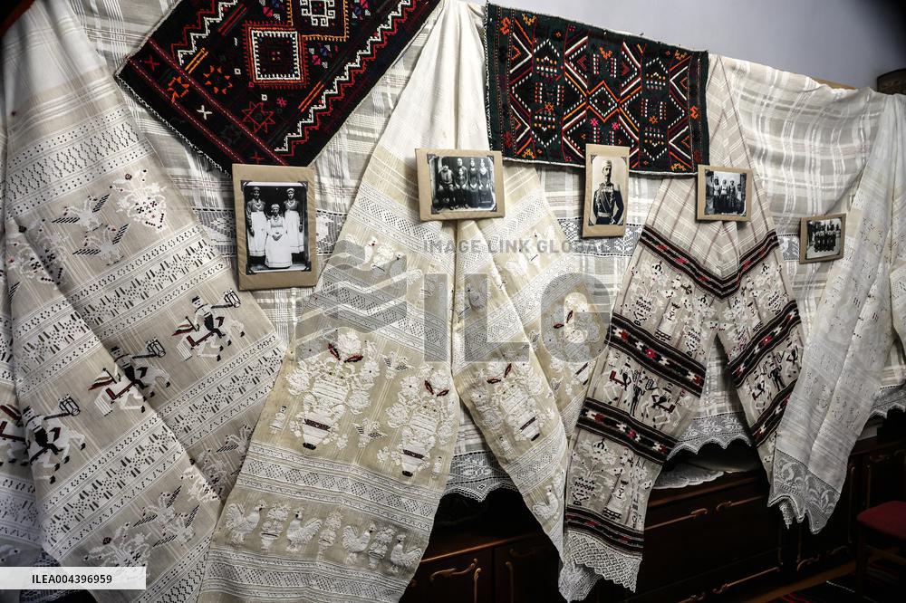Collection of old Bulgarian towels, clothes and jewelry in Krynychne village